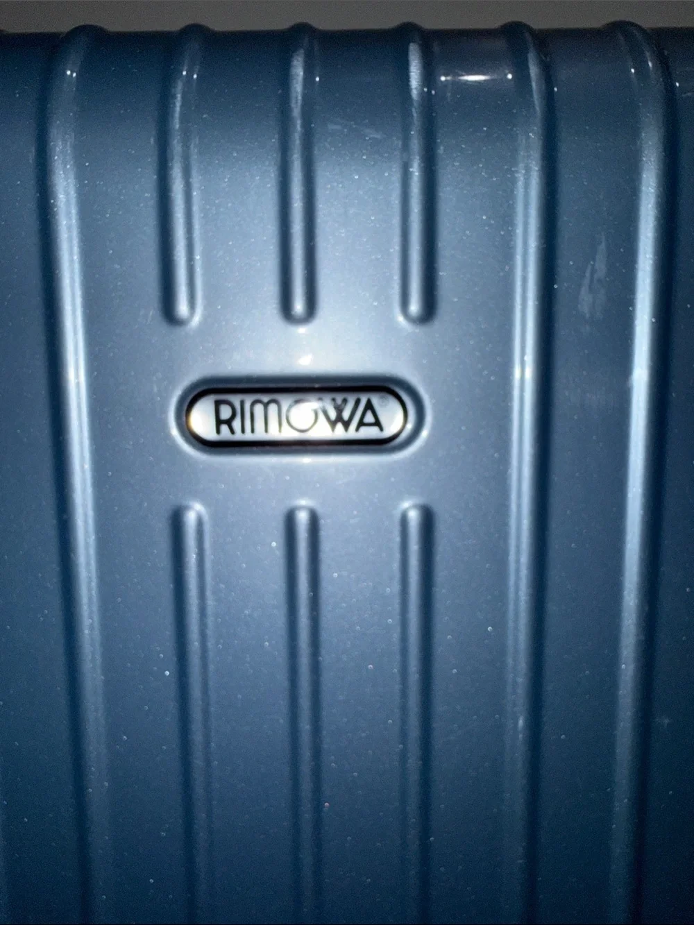 RIMOWA Salsa Air Multiwheel acrylic suitcase in Ice Blue.